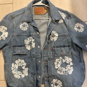 Levi's Blue Denim Jacket with White Floral Design